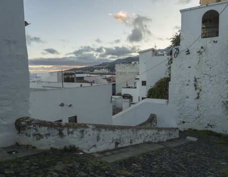 Old stone stairs with shabby white walls at the center of Santa Cruz De La Palma, La Palma Island, Canary Islands, Spain.