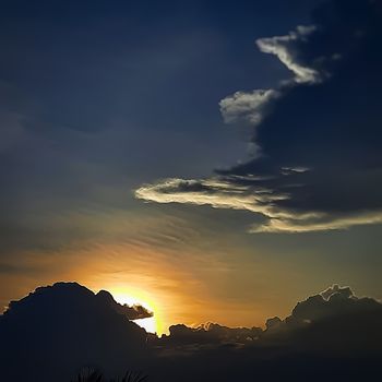 Beautiful view of sunset looks like a dragon in front of the sunset and clouds patterns view eyeopener for best imaginary background