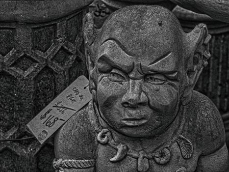 Stone statue of little orc