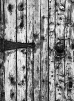 Old wooden doors with ring knocker
