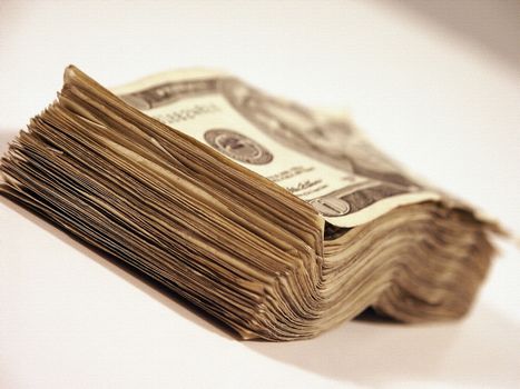 Wad of cash. 20 Dollars banknotes. Canvas