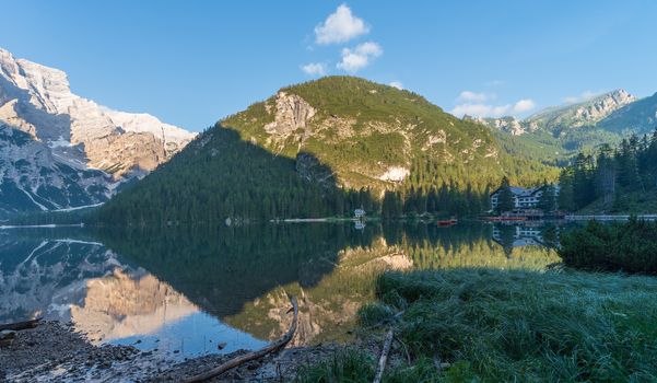 Mountain landscape with reflections on the Braies lake in Val Pusteria, South Tyrol Dolomites