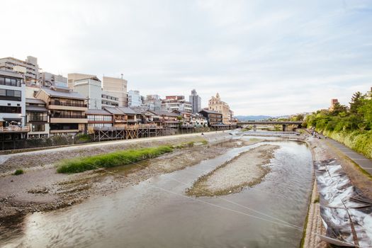 Ancient houses and restaurants along Kamo river in Gion, Kyoto, Japan