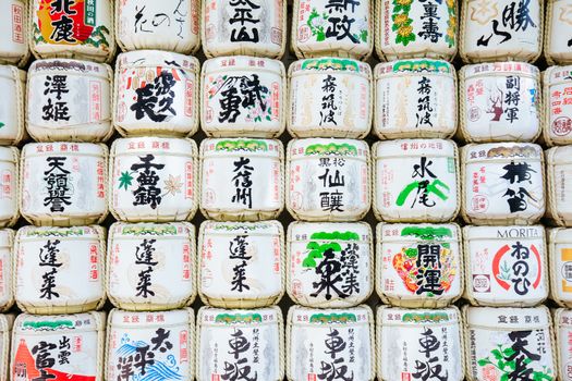 Tokyo, Japan - May 11 2019: Sake barrels at Meji-jingu Gyoen and Shrine which is a popular tourist attraction in Tokyo near Harajuku in Tokyo, Japan