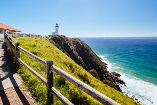 The iconic and famous Byron Bay lighthouse on a hot autumn day in Byron Bay, New South Wales, Australia.