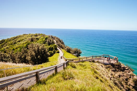 Walking path around Byron Bay lighthouse on a hot autumn day in Byron Bay, New South Wales, Australia.