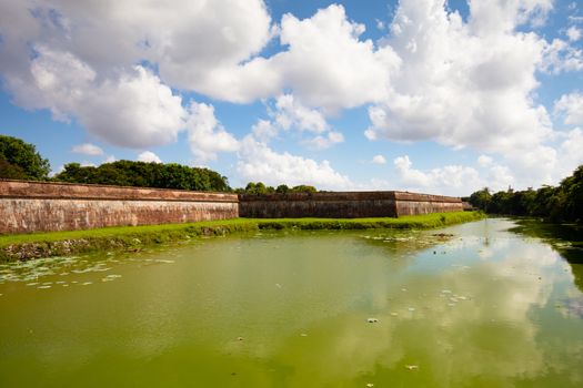 The flag tower and moat of the UNESCO World Heritage site of Imperial Palace and Citadel in Hue, Vietnam