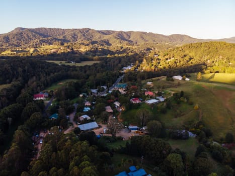 An aerial view at sunset of the rural town of Uki, near Mt Warning in NSW, Australia