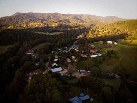 An aerial view at sunset of the rural town of Uki, near Mt Warning in NSW, Australia