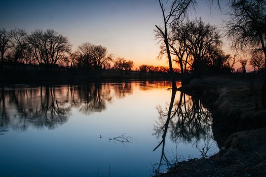 The idyllic Red River in Grand Forks USA at sunset