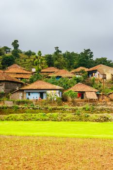 Rural housing on a moist summer's day near Ratangad fort in Maharashtra in India