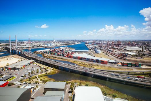 A view of the Bolte Bridge and Port Melbourne towards Williamstown in Melbourne, Victoria, Australia