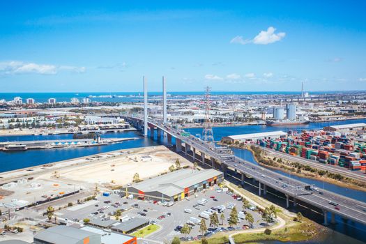 A view of Docklands and the Bolte Bridge towards Williamstown in Melbourne, Victoria, Australia