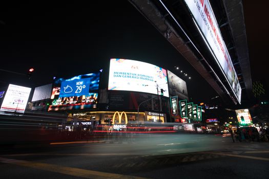 KUALA LUMPUR MALAYSIA - SEPTEMBER 12, 2019: Night time traffic in Bukit Bintang, Kuala Lumpur, Malaysia