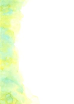 Hand painted abstract yellow and green watercolor on white background.