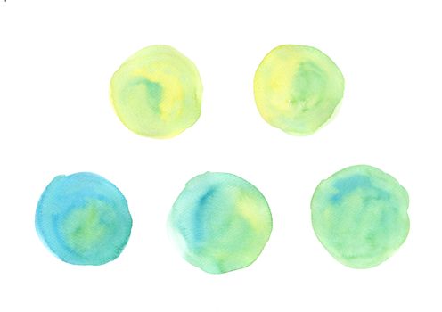 Hand painted abstract yellow and green watercolor on white background.