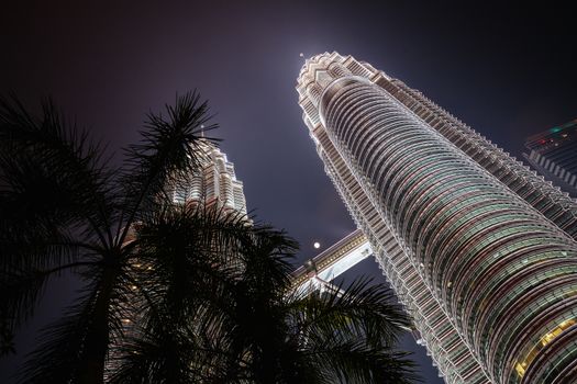 Kuala Lumpur, Malaysia - September 12 2019: The Kuala Lumpur skyline at KLCC featuring the Petronas Twin Towers and water show in Malaysia