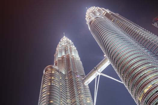 Kuala Lumpur, Malaysia - September 12 2019: The Kuala Lumpur skyline at KLCC featuring the Petronas Twin Towers and water show in Malaysia