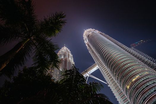 Kuala Lumpur, Malaysia - September 12 2019: The Kuala Lumpur skyline at KLCC featuring the Petronas Twin Towers and water show in Malaysia