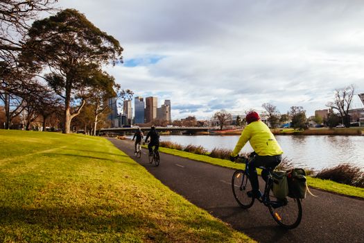 Melbourne, Australia - August 15, 2018: The Melbourne skyline from along the Yarra River near Morell Bridge on a cool winter's morning