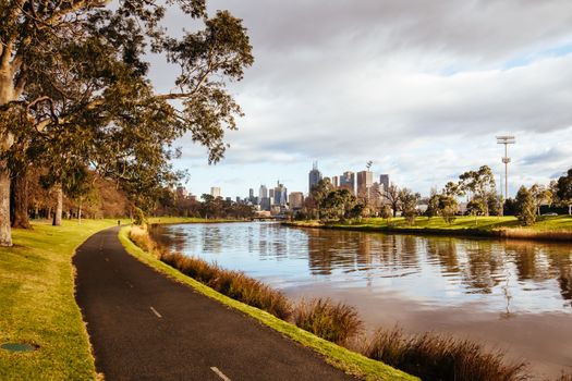 Melbourne, Australia - August 15, 2018: The Melbourne skyline from along the Yarra River near Morell Bridge on a cool winter's morning