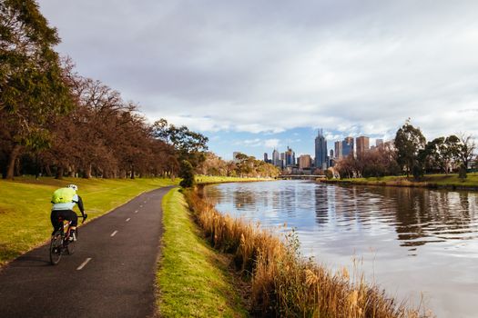 Melbourne, Australia - August 15, 2018: The Melbourne skyline from along the Yarra River near Morell Bridge on a cool winter's morning