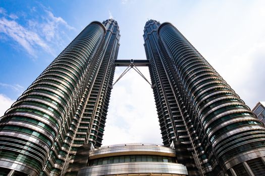 Kuala Lumpur, Malaysia - March 19 2019: The Kuala Lumpur skyline featuring KLCC Park and Petronas Twin Towers in Malaysia