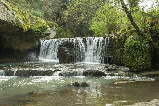 waterfall of fosso castello in soriano nel cimino viterbo in the wood