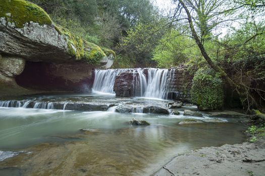 waterfall of fosso castello in soriano nel cimino viterbo in the wood