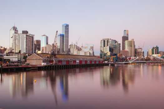 Melbourne, Australia - June 26 2013: Melbourne skyline from South Wharf up the Yarra River at dusk in Melbourne, Victoria, Australia