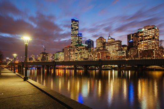 Melbourne, Australia - July 2 2013: Melbourne skyline along the Yarra River at dusk in Victoria Australia