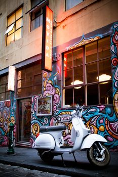 Melbourne, Australia - December 20 - Melbourne's famous Hosier Lane with motorcycle and graffiti on December 20th 2013.