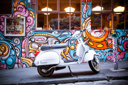 Melbourne, Australia - December 20 - Melbourne's famous Hosier Lane with motorcycle and graffiti on December 20th 2013.
