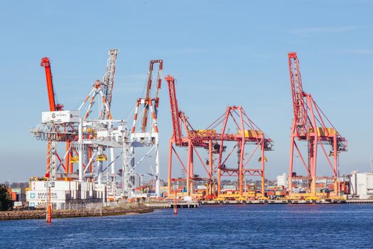 Melbourne, Australia - 17 December 2013: Coode Island shipping port with boats being unloaded in Melbourne, Victoria, Australia