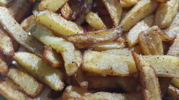 Potato fried or roasted slices on clean background with copy space for text