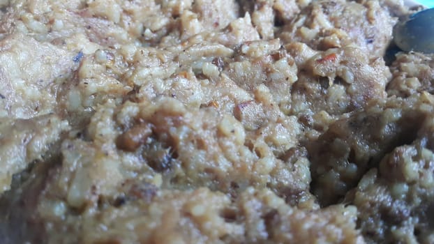 A close up view of Cooked white rice called Kichra served with green mint with traditional Charsadda recipe popular for its delicious taste in Pakistan