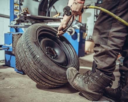 inflation of car tires with compressed air.