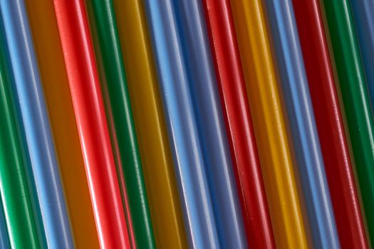 Abstract Background Multicolored Plastic Drinks Tubes. Close-up. High quality photo