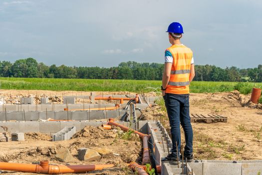 designer on the construction of the foundation of the building.