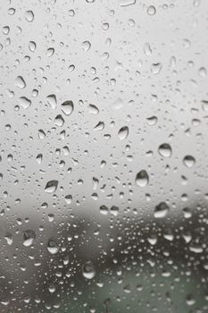 Drops of rain on the window, shallow dof