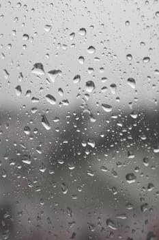 Drops of rain on the window, shallow dof.