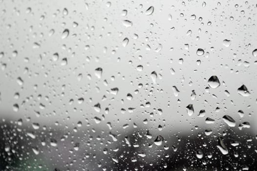 Drops of rain on the window, shallow dof.