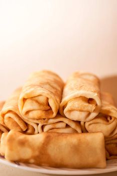 Homemade flour pancakes in a white plate. High quality photo