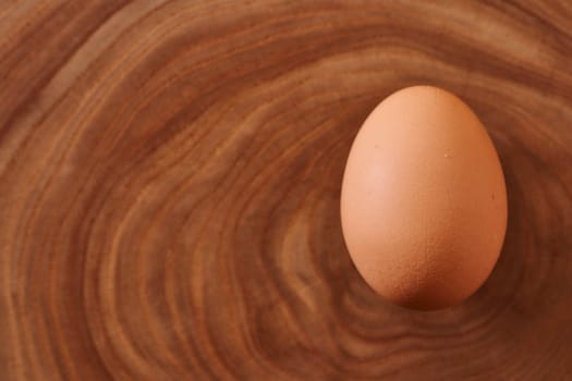 chicken eggs on a wooden background. Concept photo. Close-up. High quality photo