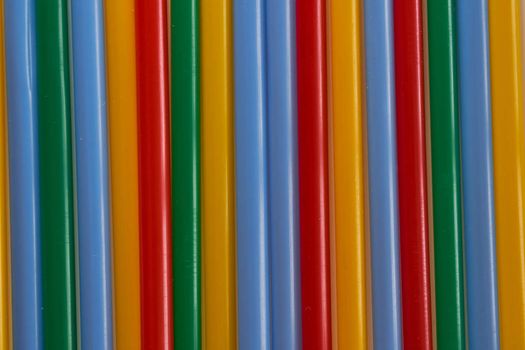 Abstract Background Multicolored Plastic Drinks Tubes. Close-up. High quality photo