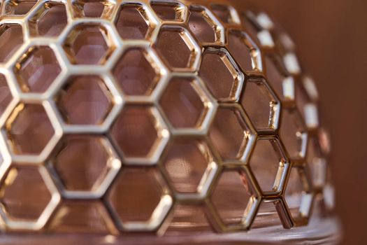 Cellular grate on glassware. Macro effect photo.Close-up. High quality photo