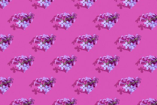 Trendy isometric Seamless continuous pattern with spring lilac flowers on pink background. Minimalist concept. Space for text