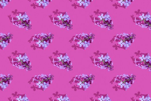 Trendy isometric Seamless continuous pattern with spring lilac flowers on pink background. Minimalist concept. Space for text