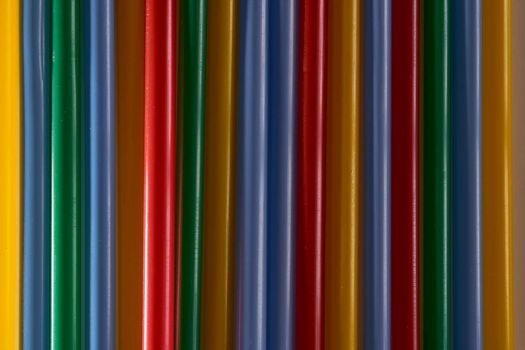 Abstract Background Multicolored Plastic Drinks Tubes. Close-up. High quality photo