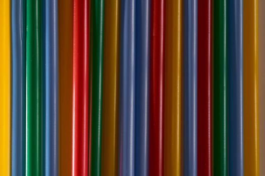 Abstract Background Multicolored Plastic Drinks Tubes. Close-up. High quality photo